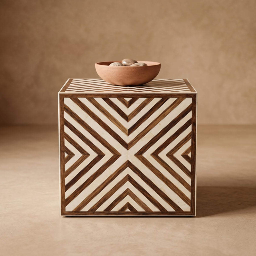 Brown and cream chevron cube side table topped with a shallow bowl