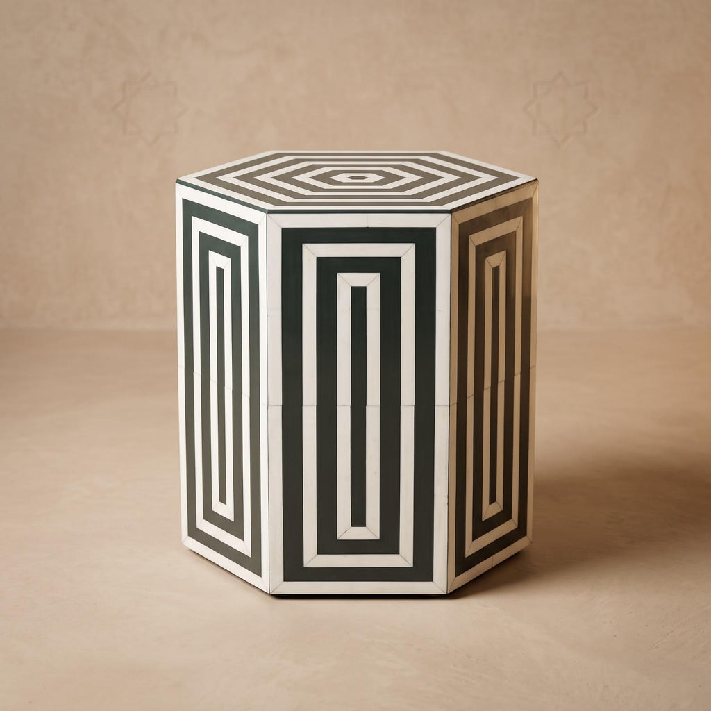 Hexagonal green and cream side table showing geometric inlay on its top and sides
