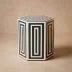 Hexagonal green and cream side table showing geometric inlay on its top and sides