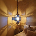NEOMEDINA Moroccan colored glass lantern pendant in a bedroom