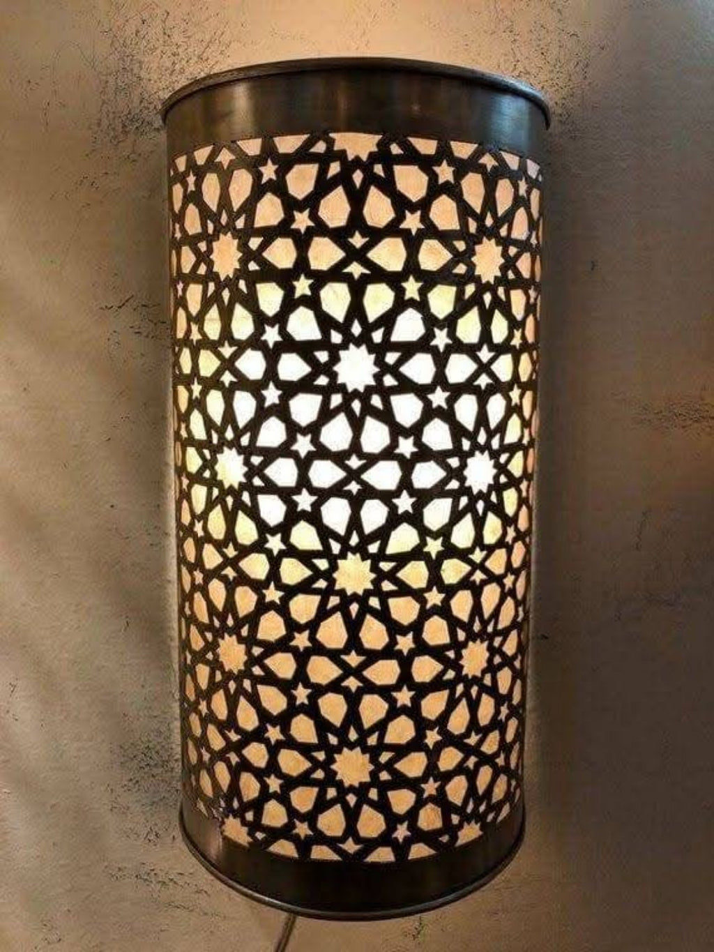 Moroccan brass wall sconce with star lattice pierced pattern, 27 by 16 cm