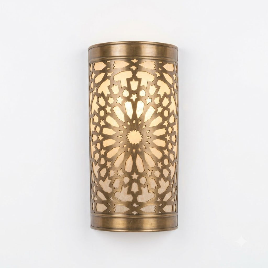 Moroccan brass wall sconce with starburst pierced pattern, 27 by 16 cm