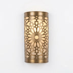 Moroccan brass wall sconce with starburst pierced pattern, 27 by 16 cm