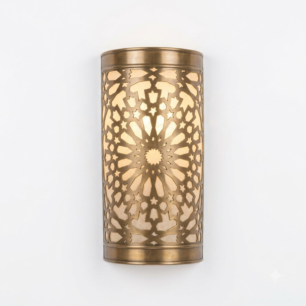 Moroccan brass wall sconce with starburst pierced pattern, 27 by 16 cm