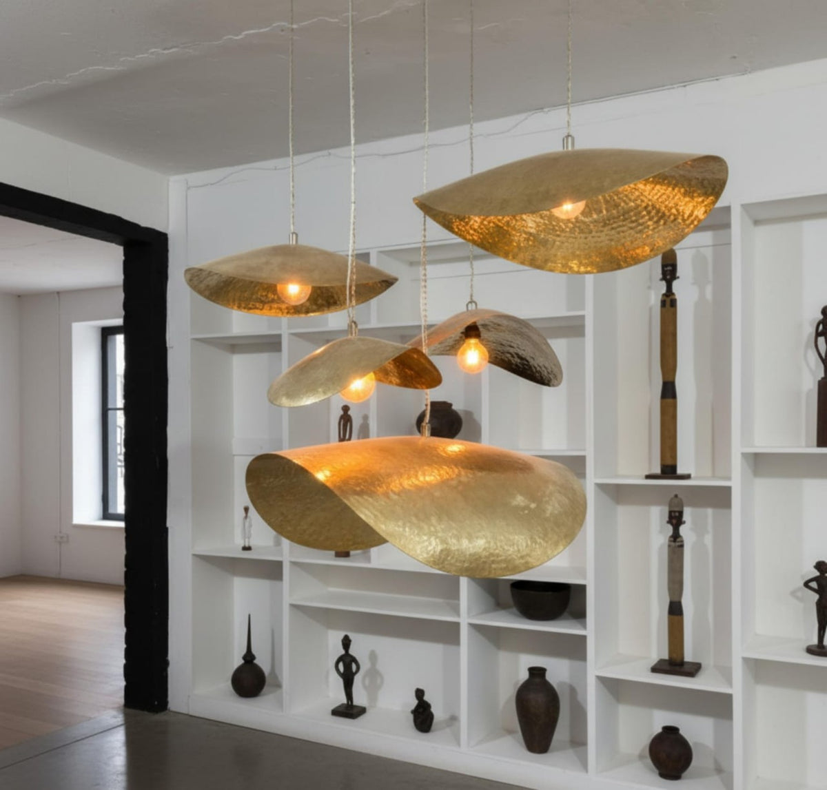 NEOMEDINA sculptural hammered brass petal pendant lights in a modern interior