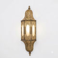 Arched Lantern Moroccan wall sconce in a gold tone