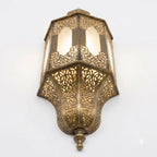 Moroccan arched brass lantern wall sconce with open upper panels and pierced lower panels