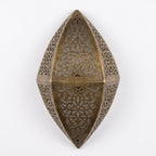 Dark brass faceted teardrop wall sconce with pierced floral panels