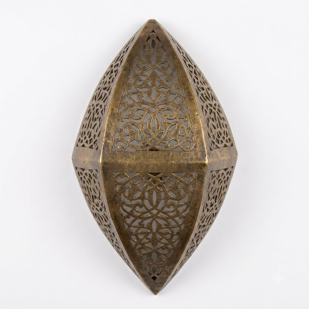 Dark brass faceted teardrop wall sconce with pierced floral panels