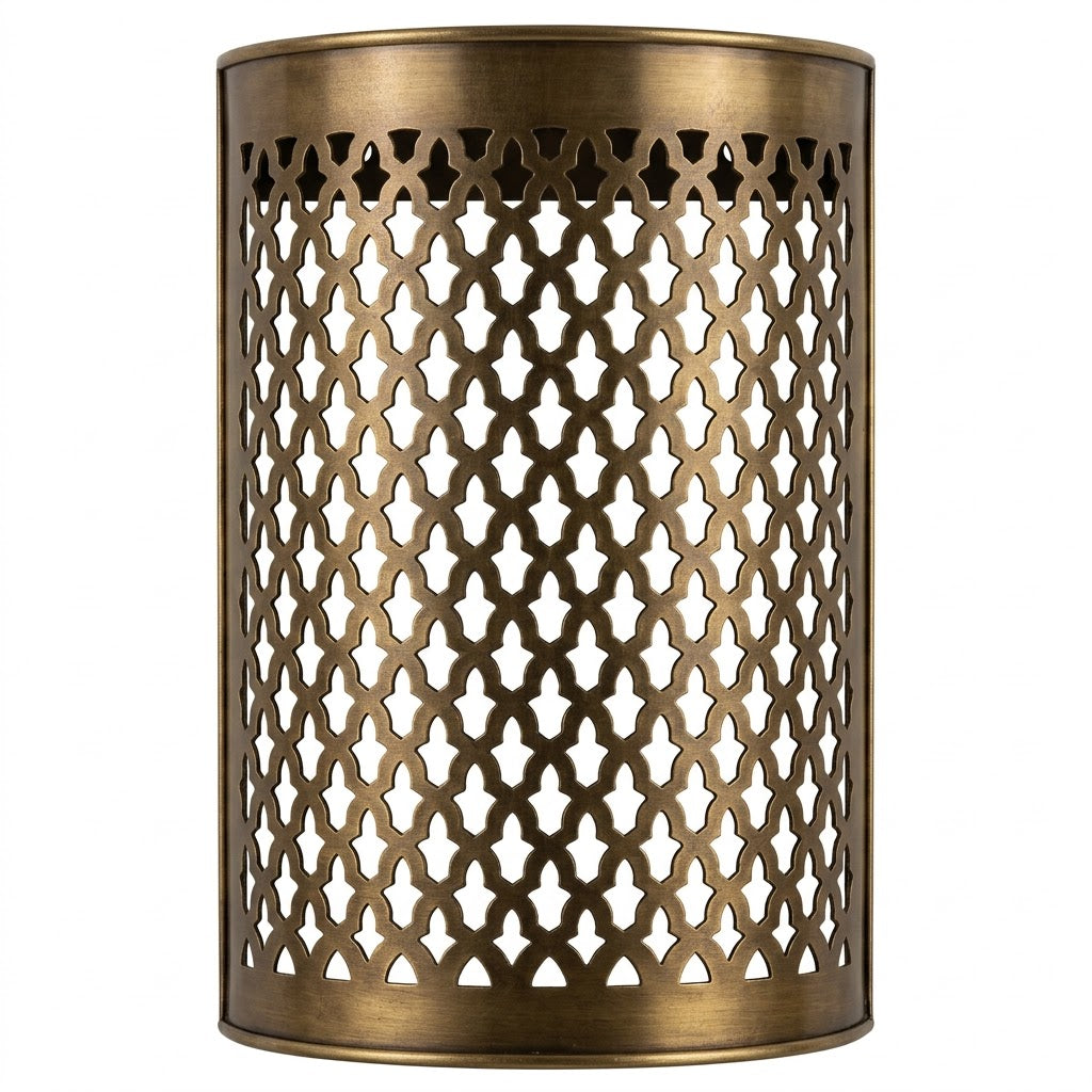 Front view of a curved Moroccan brass wall sconce with lattice perforations