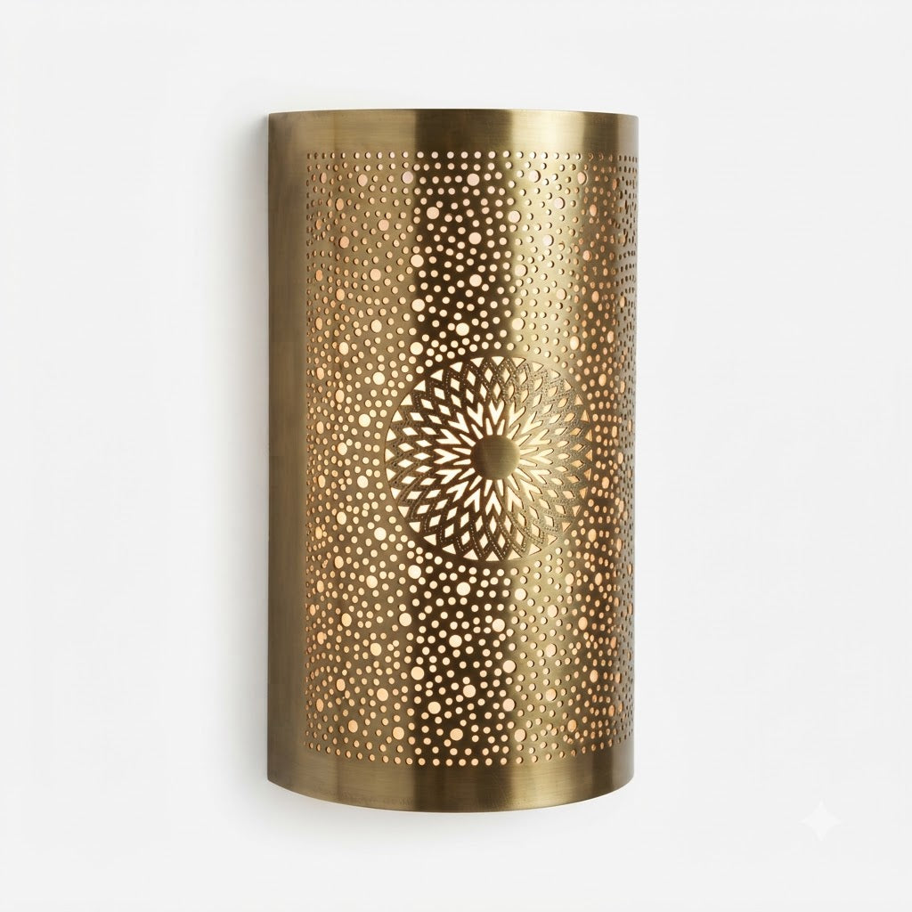 Curved brass wall sconce with two pierced sunflower medallions