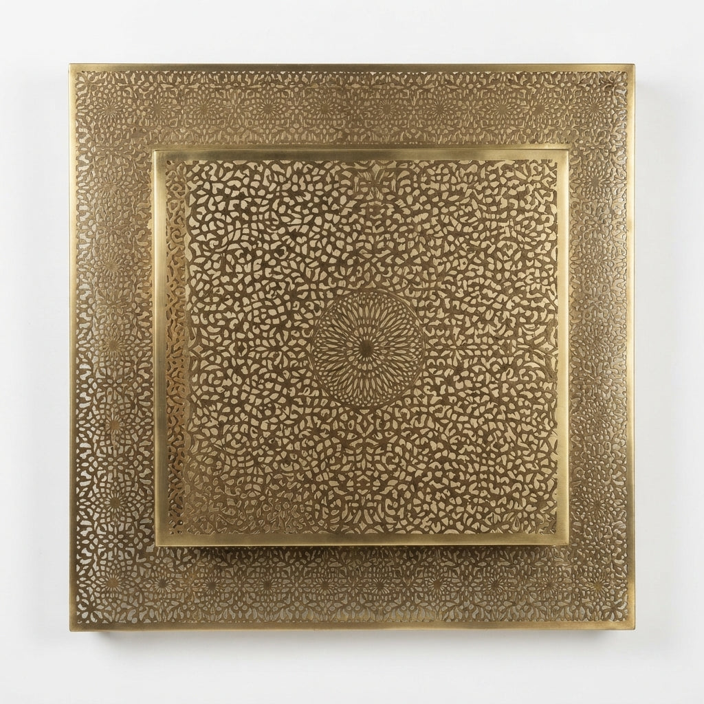 Front view of a square brass wall light with a central rosette and densely pierced border