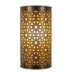 Curved dark brass wall sconce glowing through a geometric star lattice