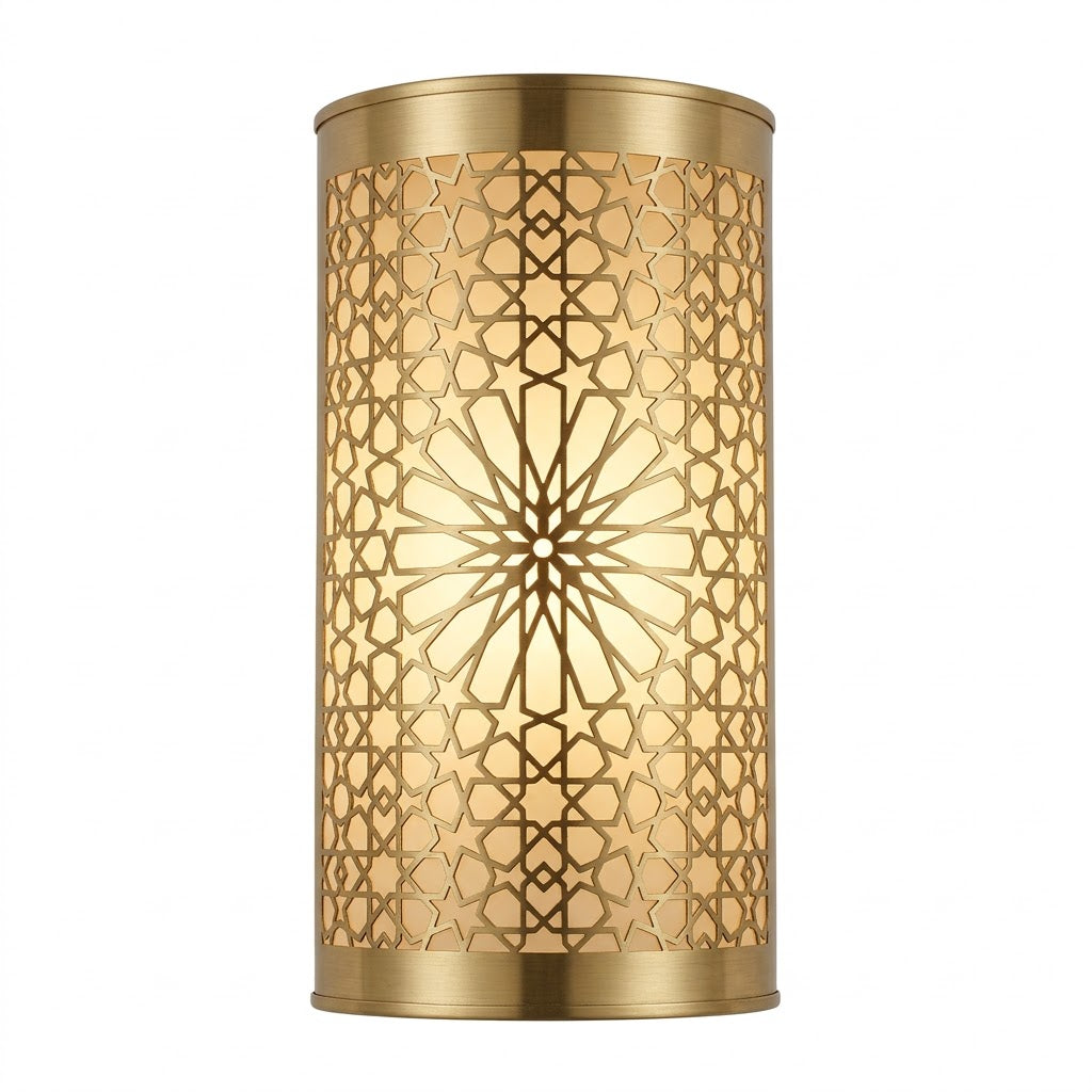 Front view of a gold-toned brass wall sconce with a pierced floral rosette