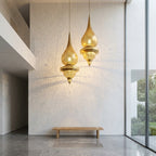 Moroccan Double Teardrop Pendant 1 m with a double-body teardrop silhouette and pierced brass