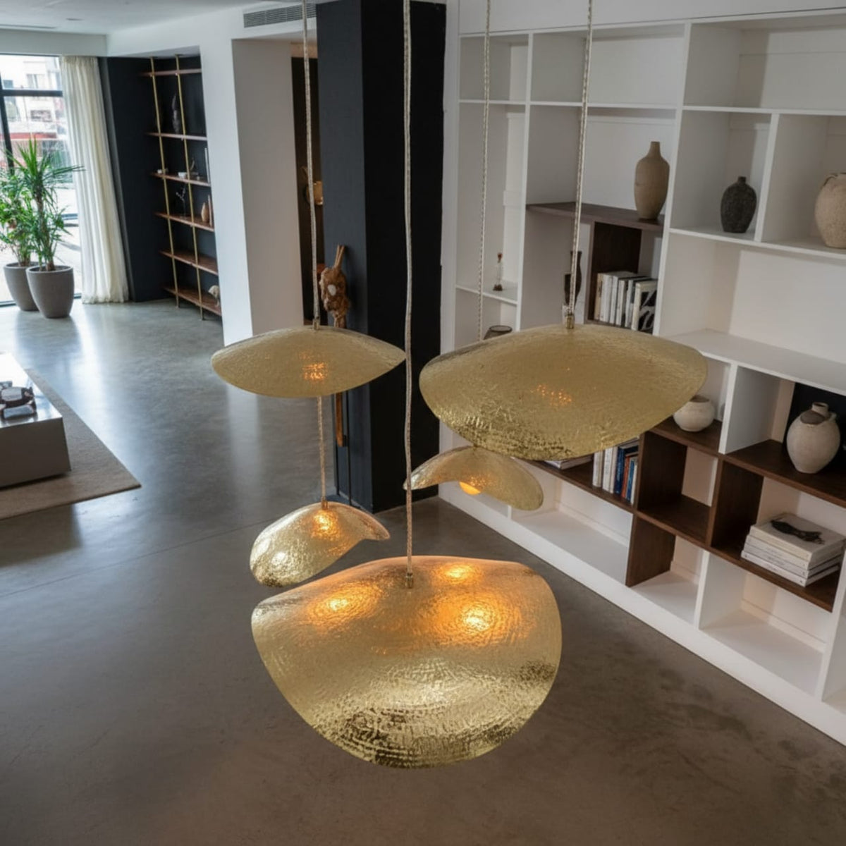 Hammered Brass Petal Pendant Light with curved hammered brass petals
