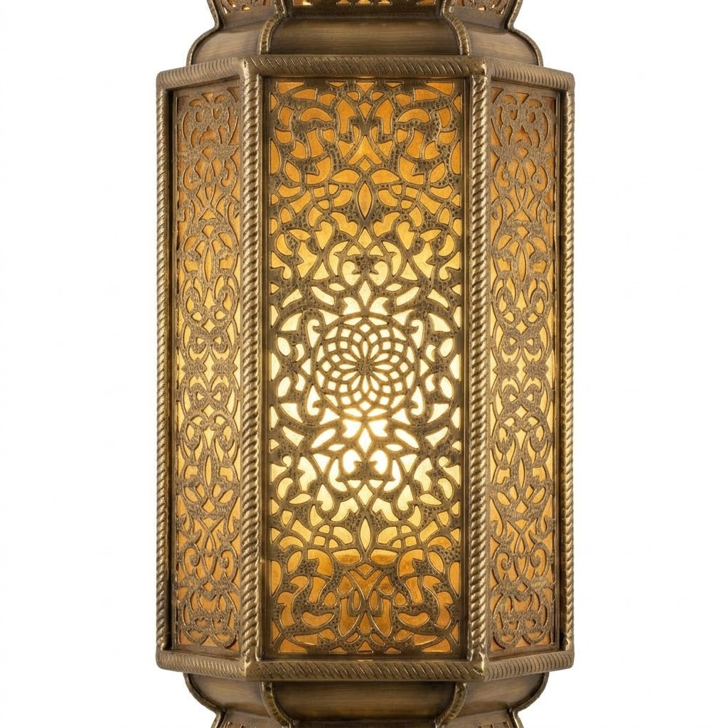 Front view of an ornate brass tower wall lantern with pierced floral panels